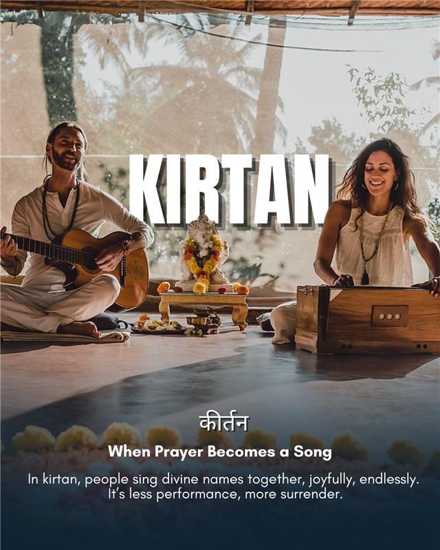 Man and woman singing kirtan with guitar and harmonium in a peaceful Indian setting, representing the spiritual Hindi word 'Kirtan'—a form of devotional chanting.